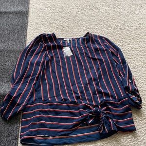 A cute navy blue red pin striped shirt!